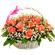 basket of coral roses with babys breath. Sri Lanka